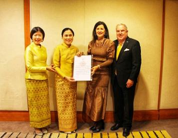 Chargé d'affaires a.i., Royal Thai Embassy, presents the copy of the Letter of Commission to Ms. Pia Orrgren